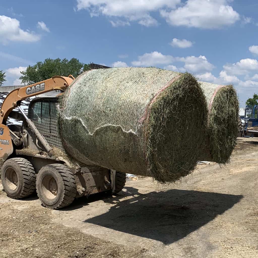 hay bails on fork lift