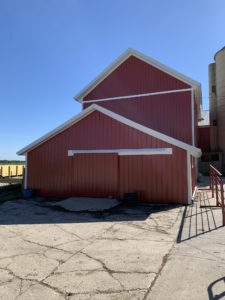 side view of barn with new siding